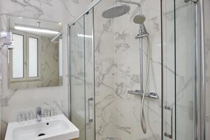 Shower, free toiletries, hair dryer, towels