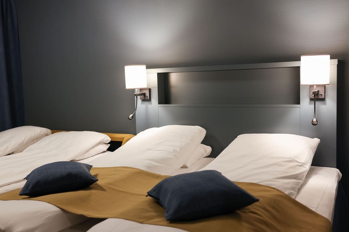 Family Room, Multiple Beds, Non Smoking | Desk, laptop workspace, iron/ironing board, free WiFi