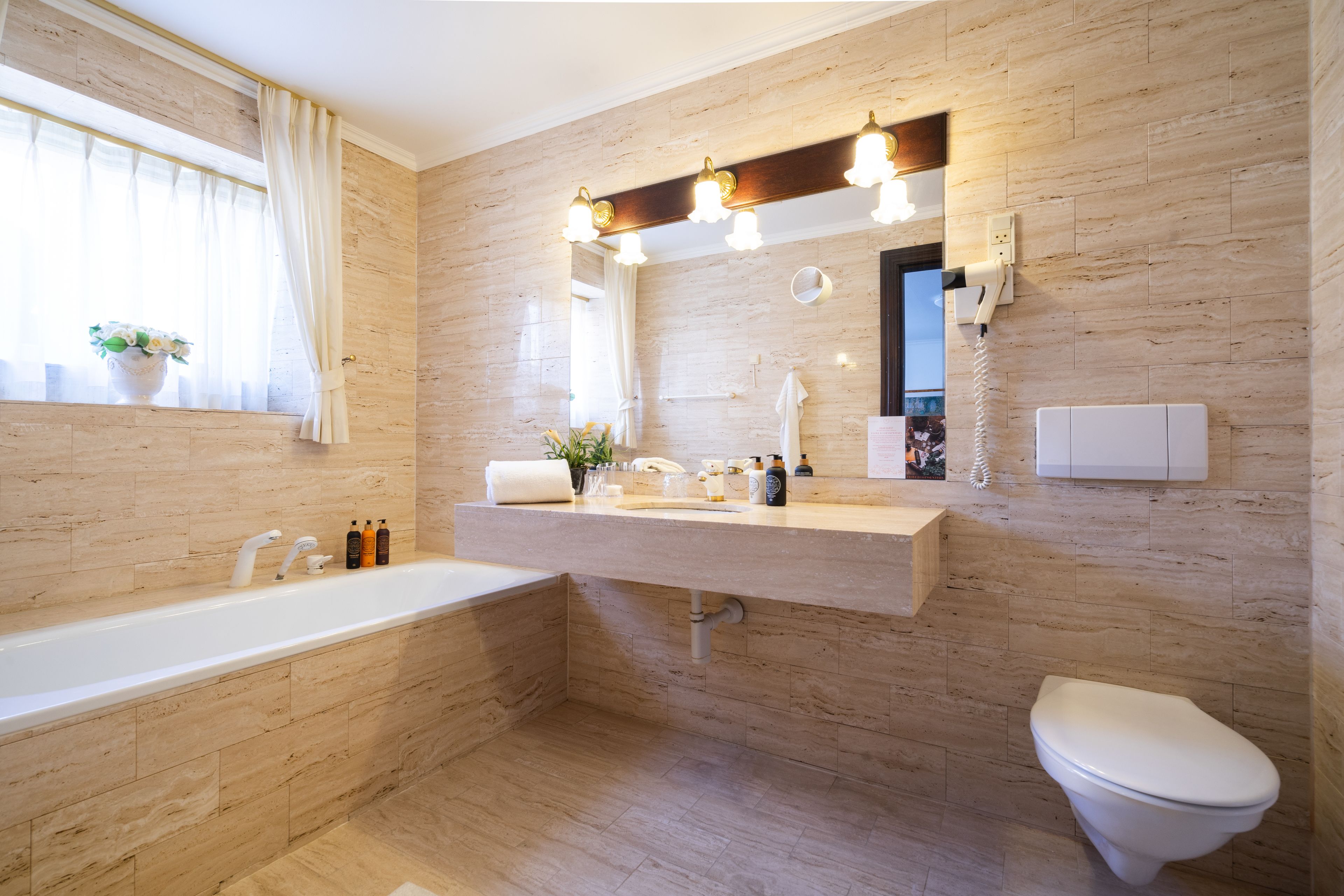classic suite | bathroom | hair dryer, bathrobes