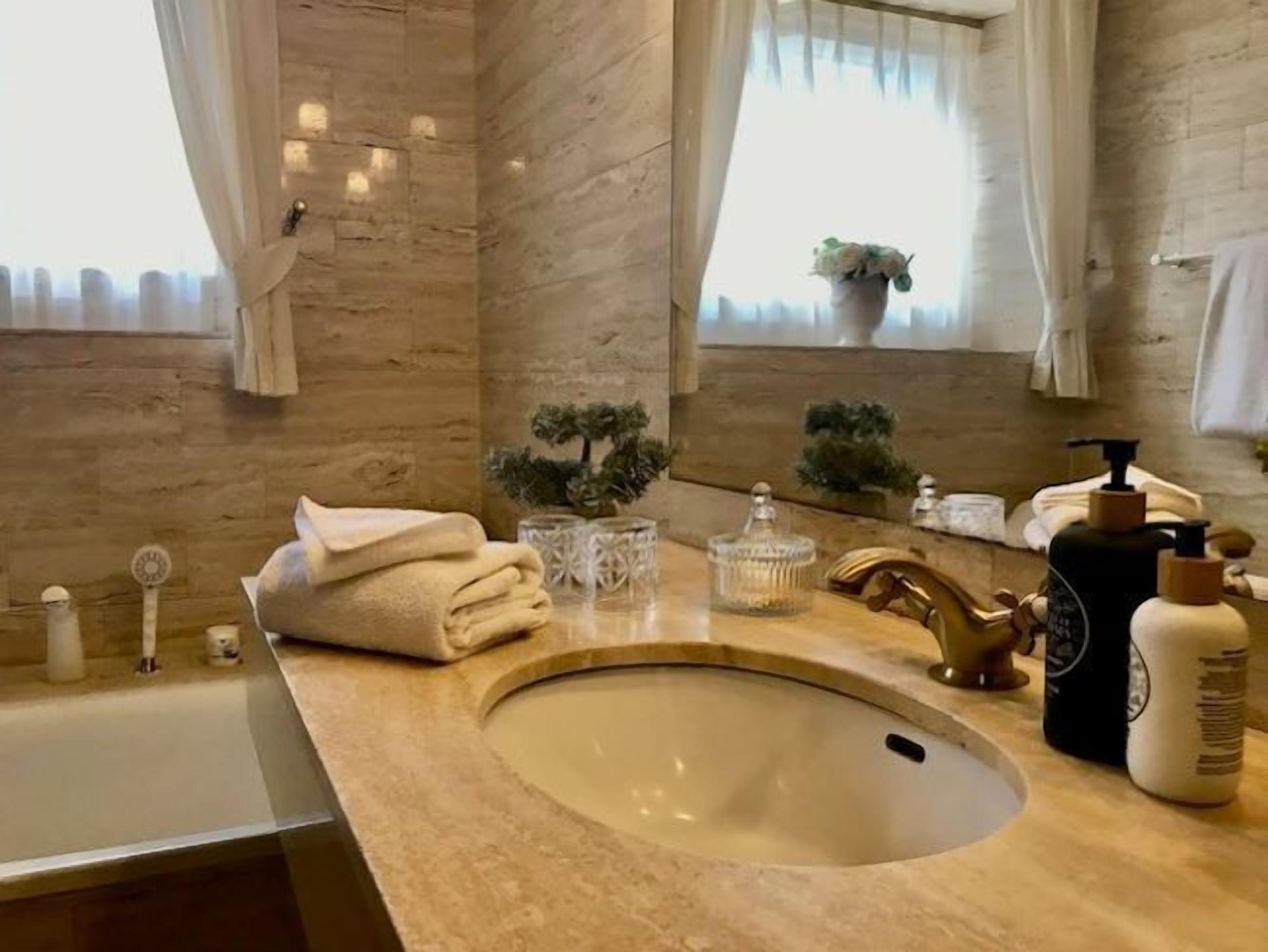 classic suite | bathroom | hair dryer, bathrobes