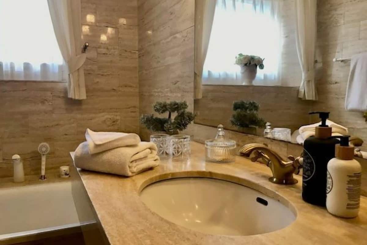 classic suite | bathroom | hair dryer, bathrobes