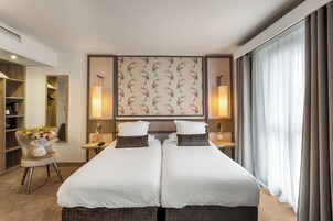 Superior kamer, 1 twee- of 2 eenpersoonsbedden | Luxe beddengoed, een minibar, een kluis op de kamer, een bureau