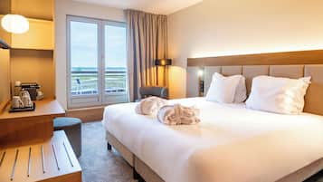 Sengetøy av topp kvalitet, minibar, safe på rommet og skrivebord