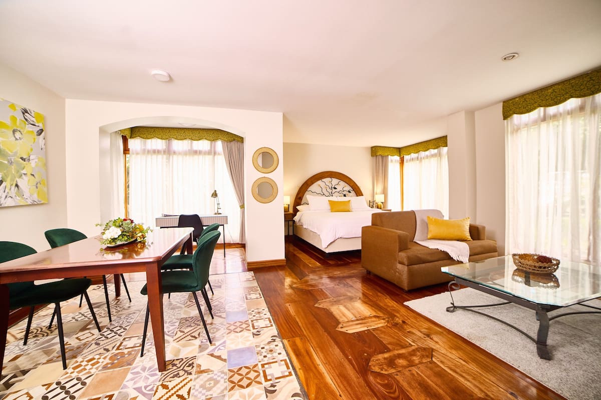 Suite, 1 King Bed | In-room safe, desk, blackout curtains, free WiFi
