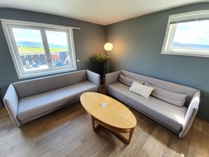 Suite Junior | Salle de séjour | Téléviseur à écran plat