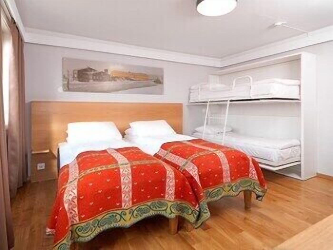 Premium bedding, desk, iron/ironing board, rollaway beds