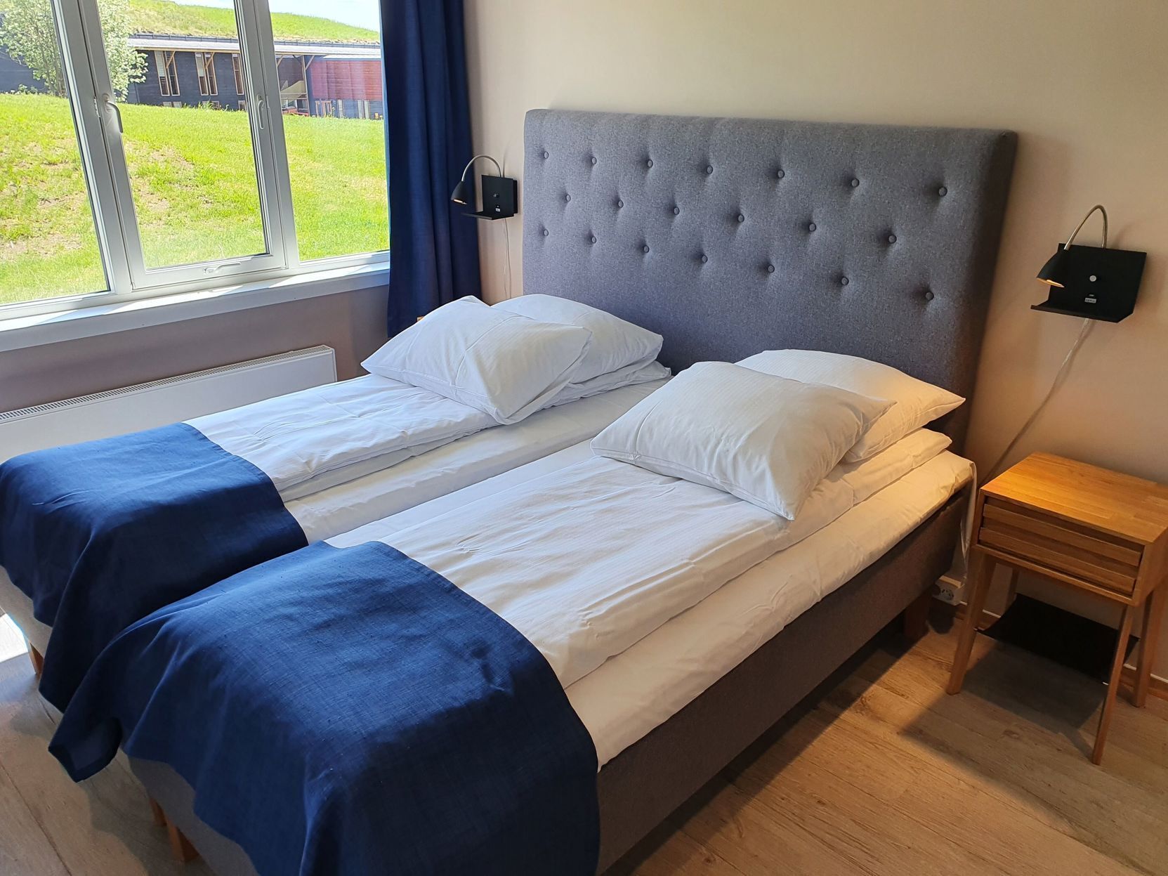 Premium bedding, desk, iron/ironing board, rollaway beds