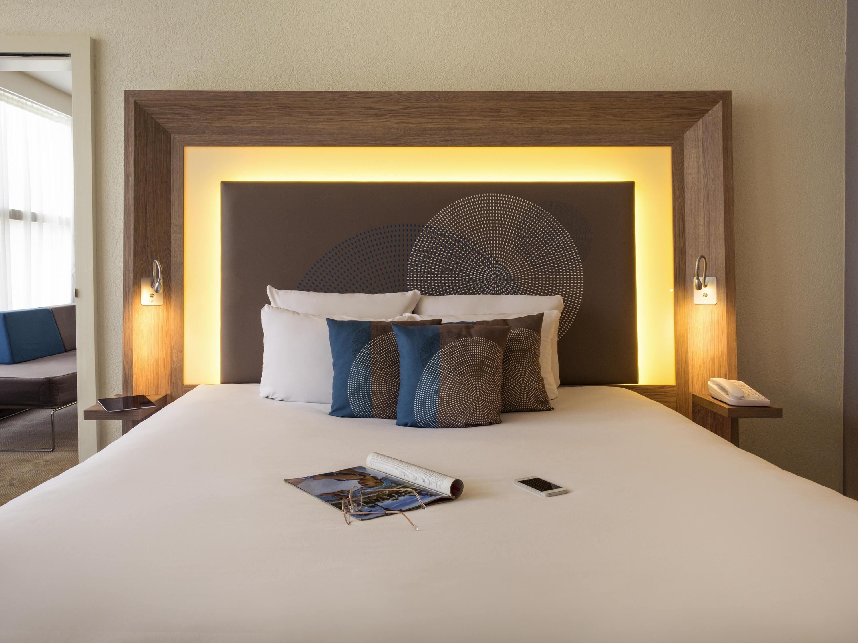 Superior suite, 1 queensize bed met slaapbank | Donsdekens, een minibar, een kluis op de kamer, een bureau