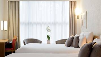 Family Room, 2 Double Beds | Down comforters, minibar, in-room safe, desk