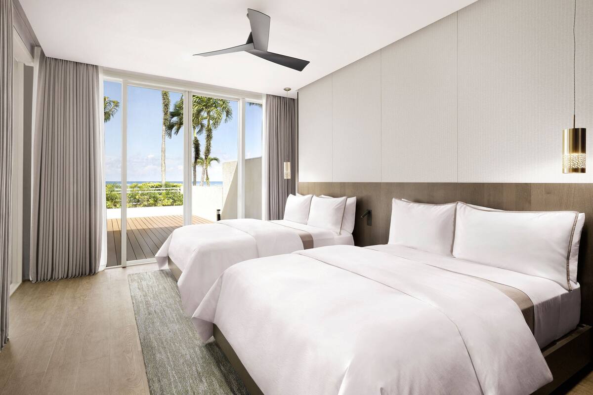 Premium bedding, down duvets, pillow-top beds, in-room safe