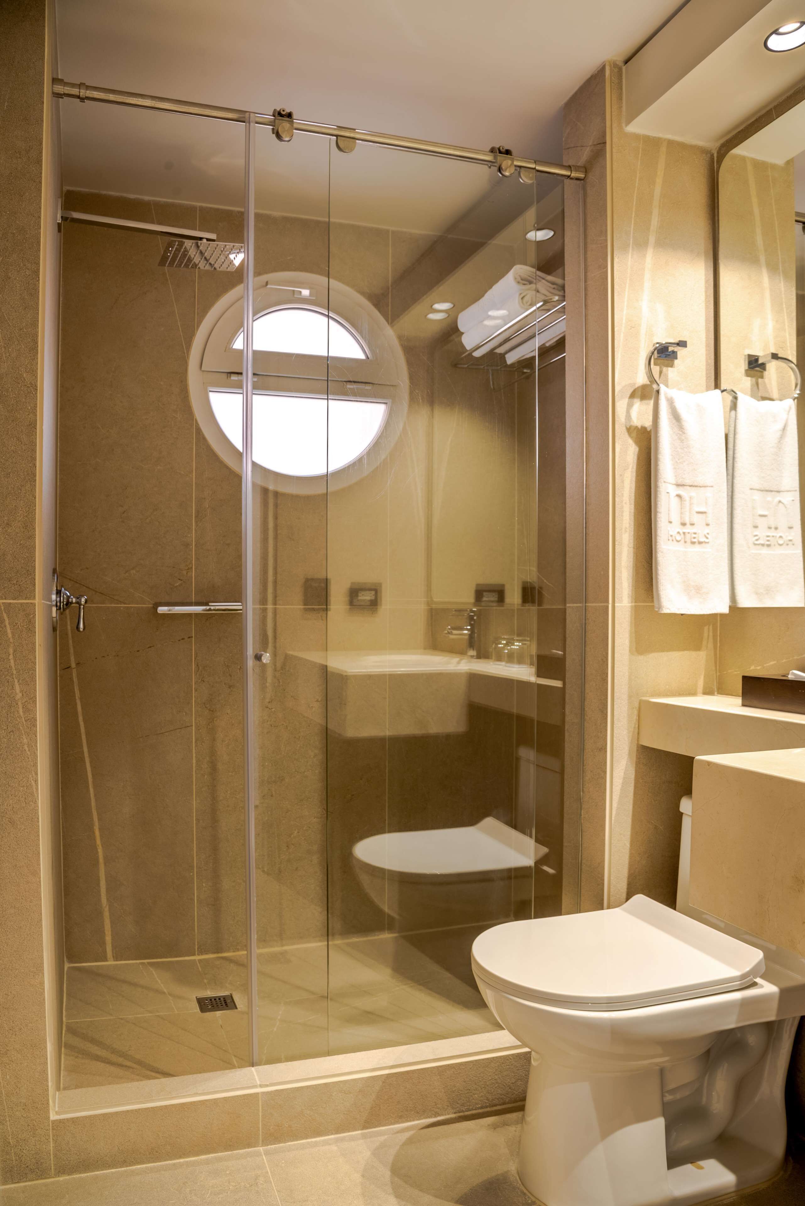 shower, rainfall showerhead, designer toiletries, hair dryer