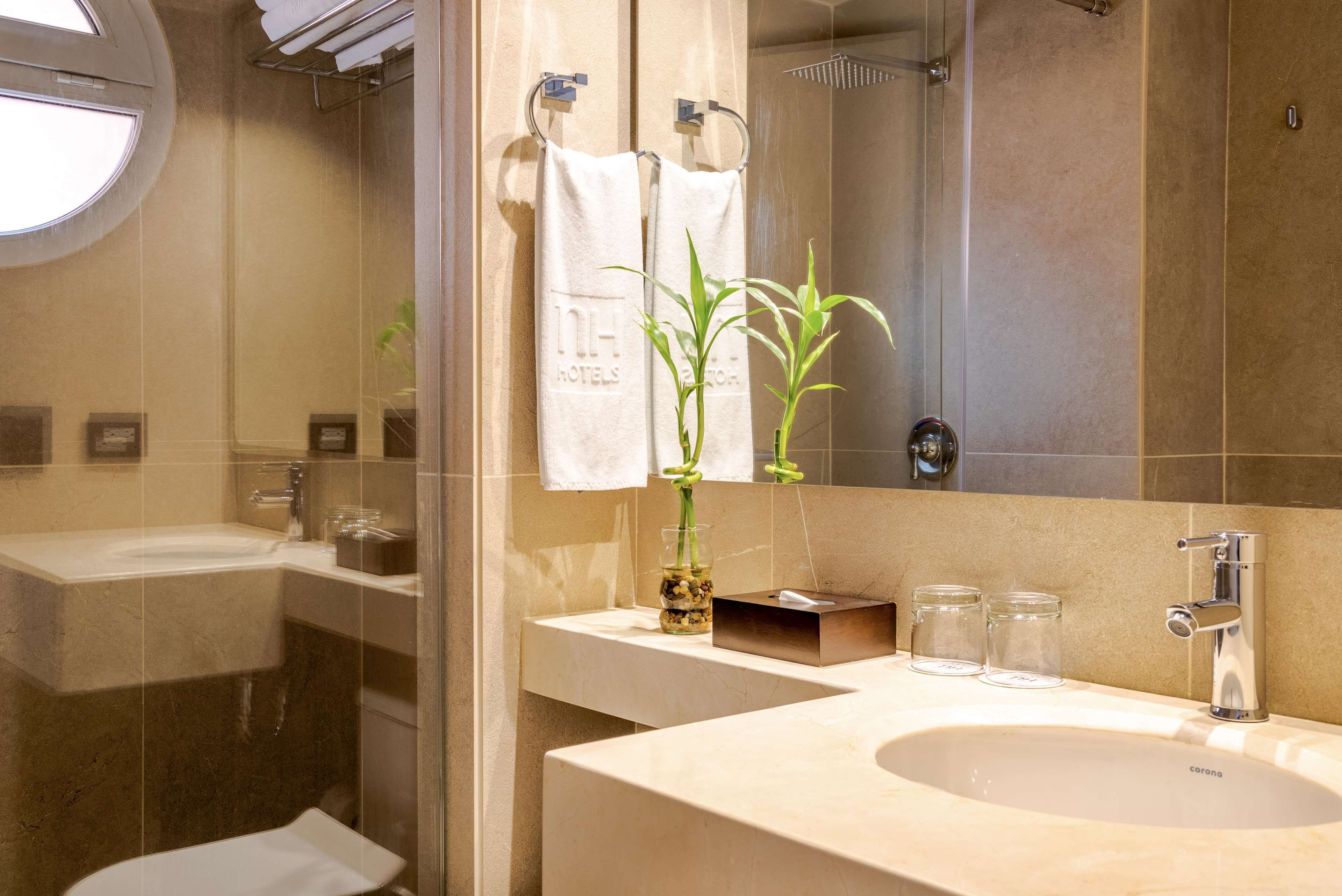 standard room | bathroom | shower, rainfall showerhead, designer toiletries, hair dryer