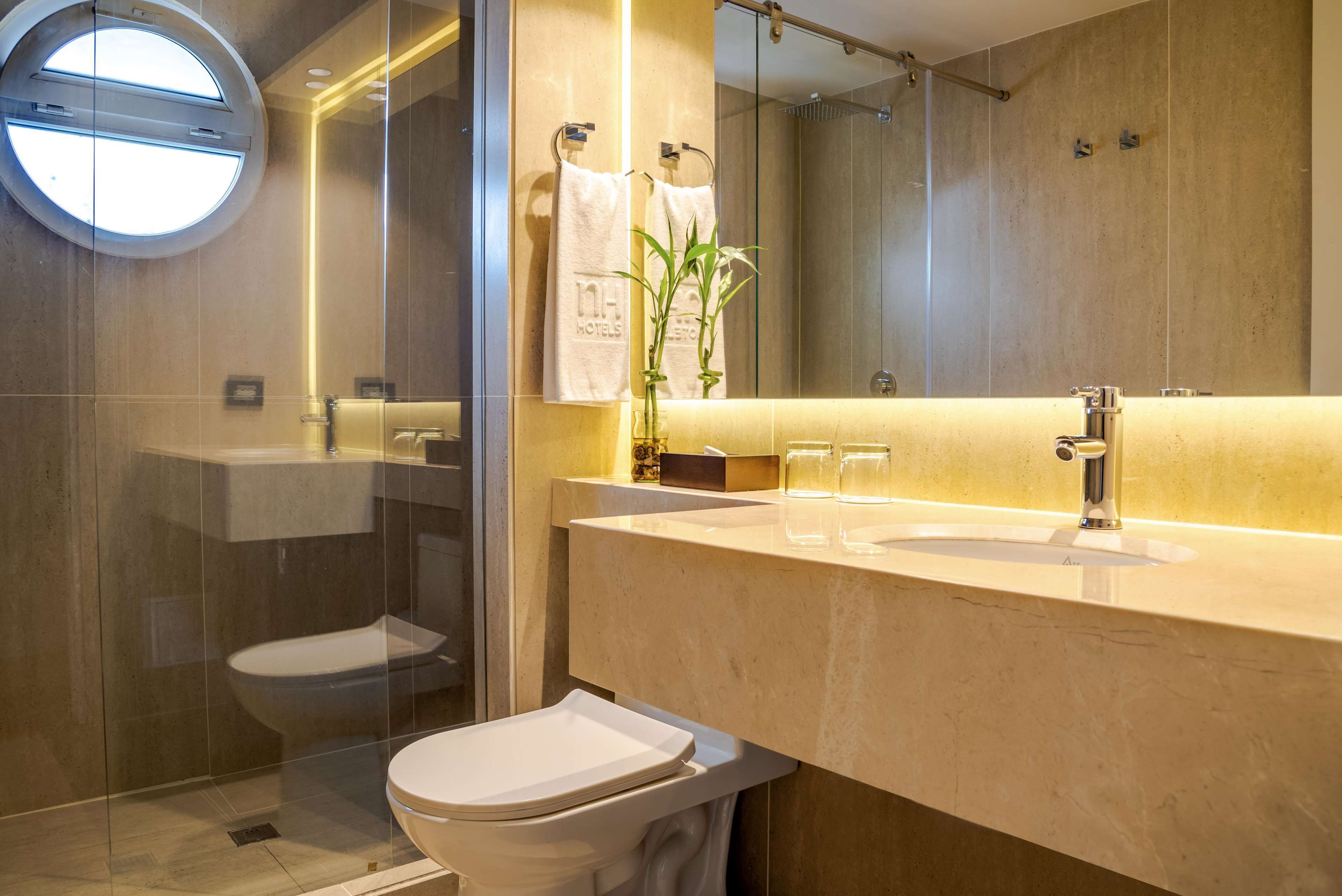 shower, rainfall showerhead, designer toiletries, hair dryer