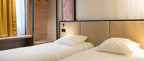 Twin Room | Premium bedding, desk, blackout drapes, soundproofing