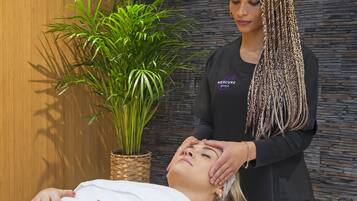 Experience a rejuvenating massage in a serene spa setting with a skilled practitioner.