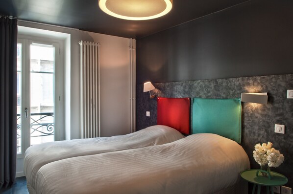 Premium bedding, memory-foam beds, in-room safe, individually furnished