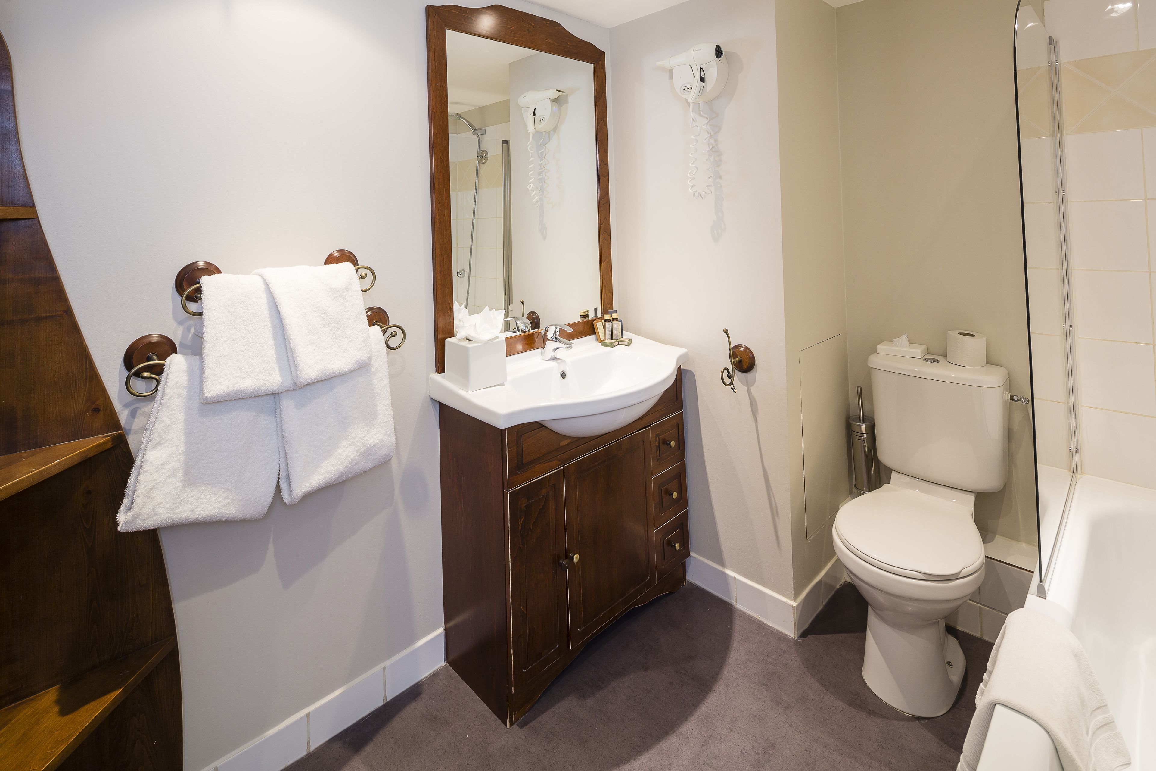 junior suite | bathroom | designer toiletries, hair dryer, slippers, towels
