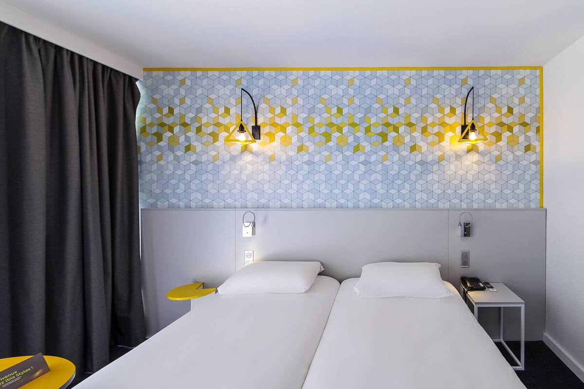 Standard Room, 2 Twin Beds | Individually furnished, laptop workspace, blackout drapes, soundproofing