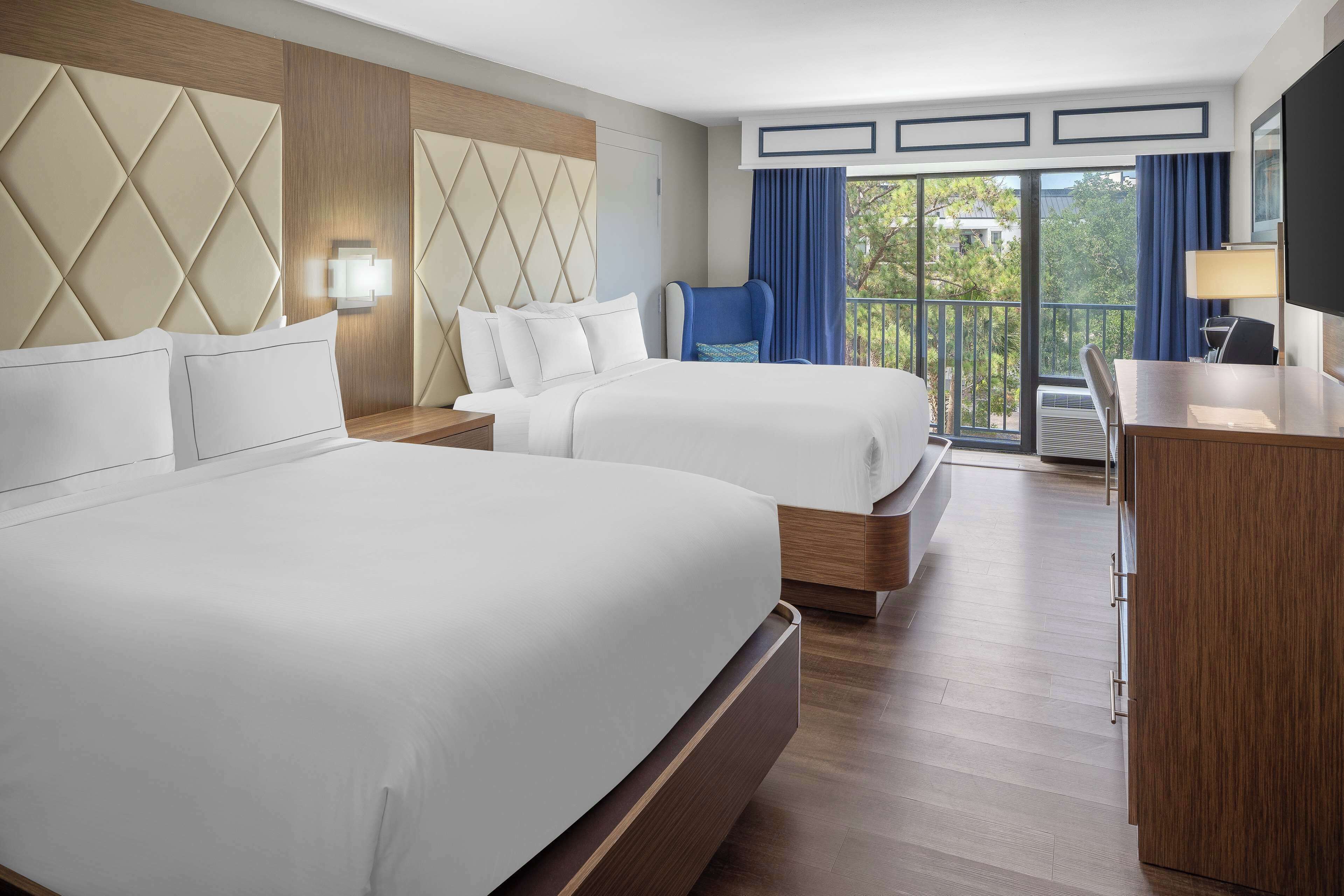 Rúmföt af bestu gerð, skrifborð, vinnuaðstaða fyrir fartölvur