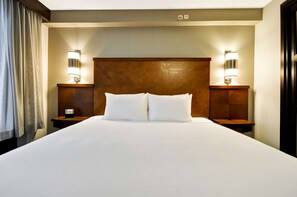 Premium bedding, down comforters, in-room safe, desk