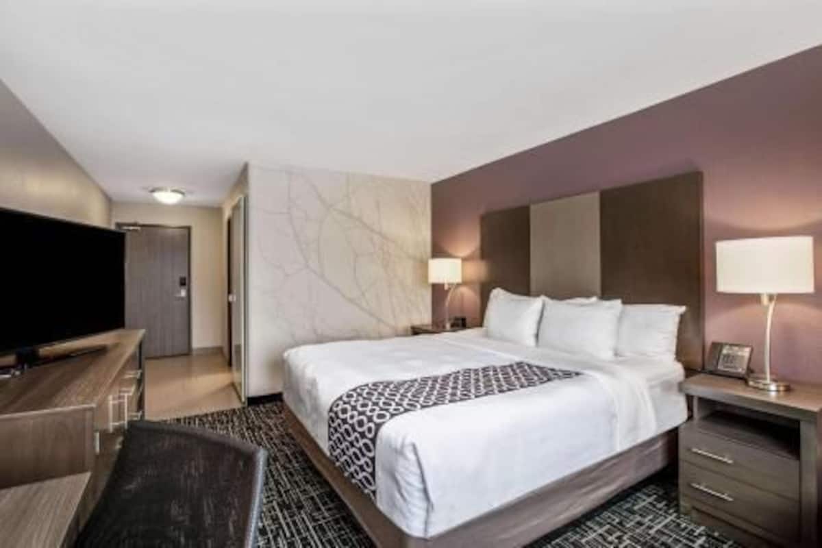 Premium bedding, desk, blackout drapes, iron/ironing board