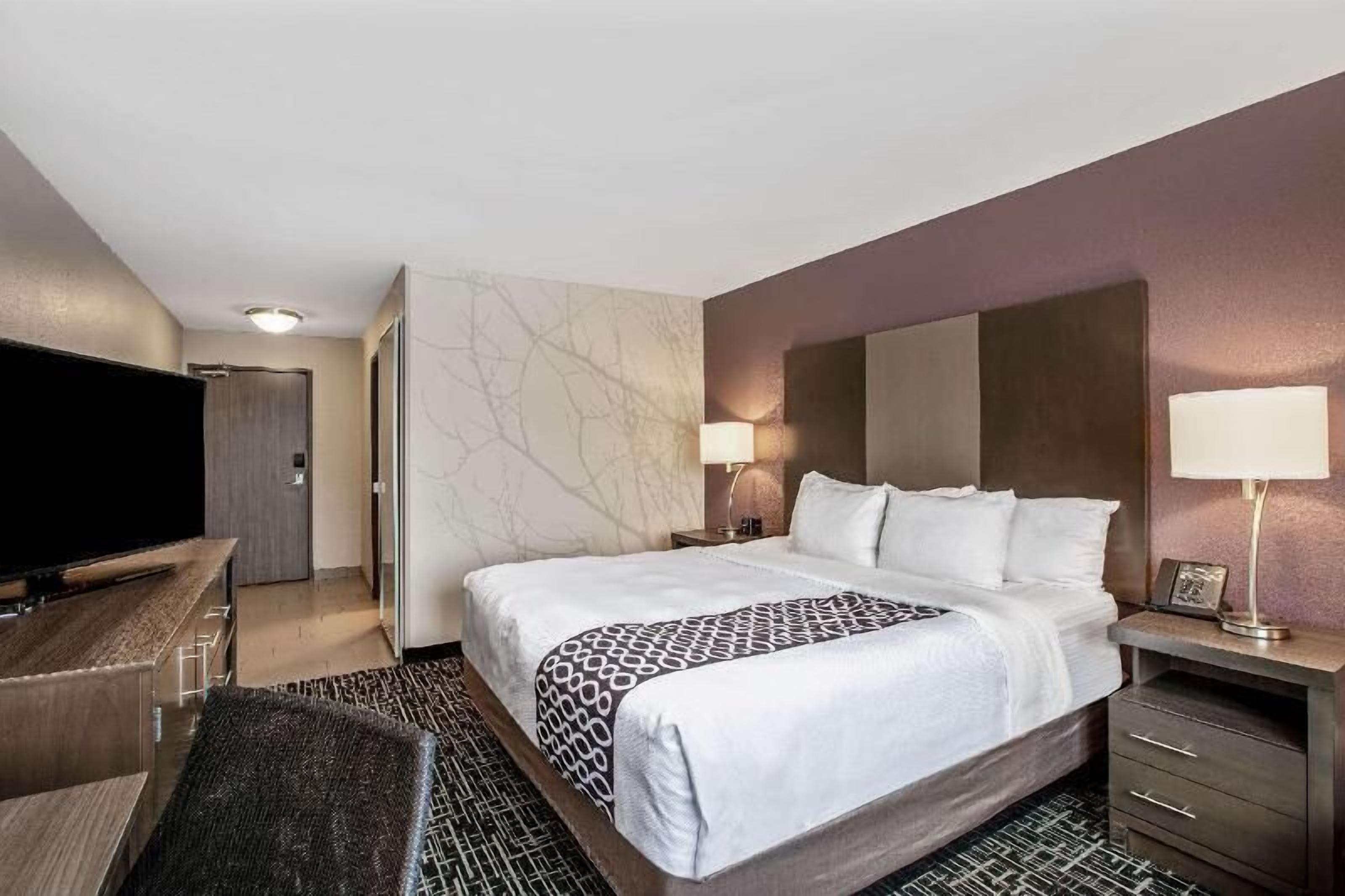 Premium bedding, desk, blackout drapes, iron/ironing board