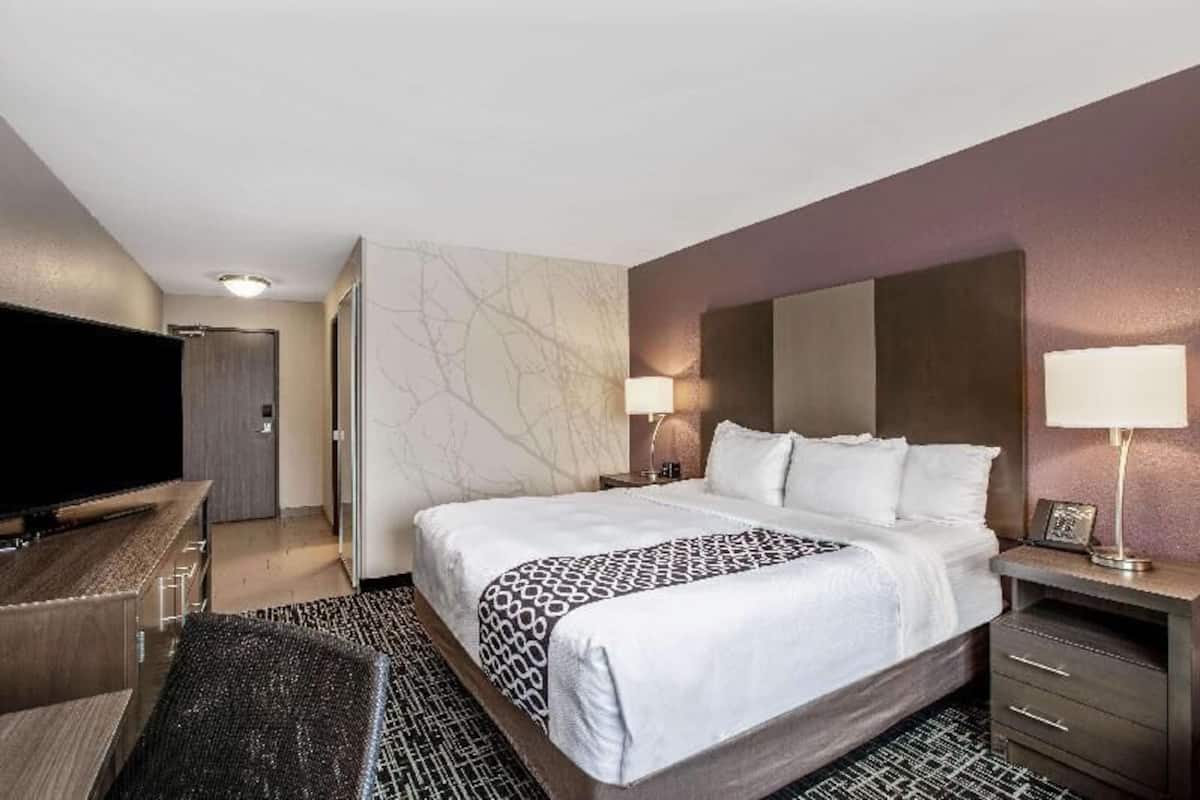 Premium bedding, desk, blackout drapes, iron/ironing board