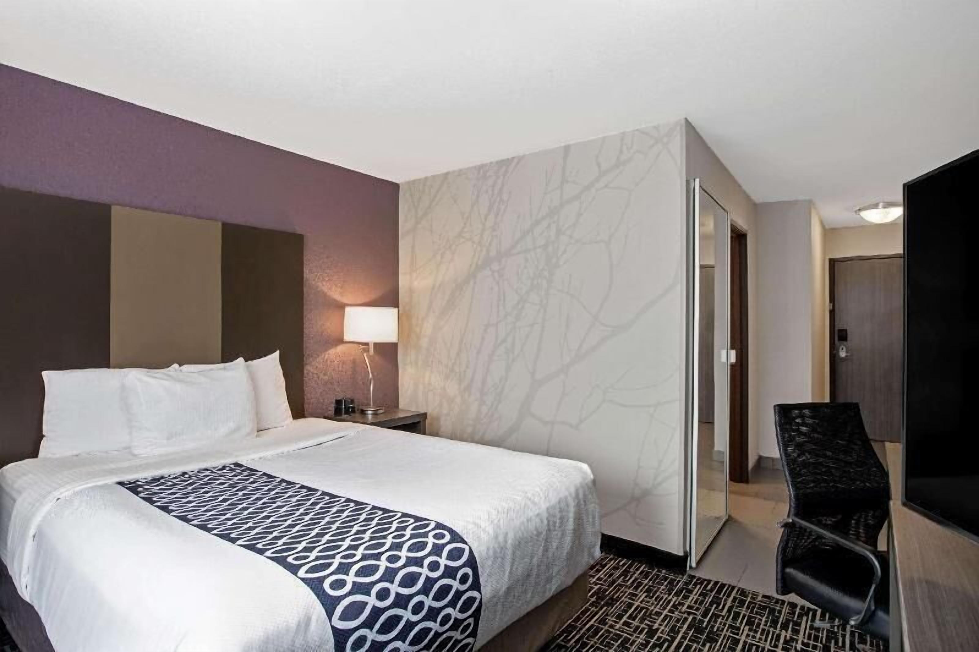 Premium bedding, desk, blackout drapes, iron/ironing board