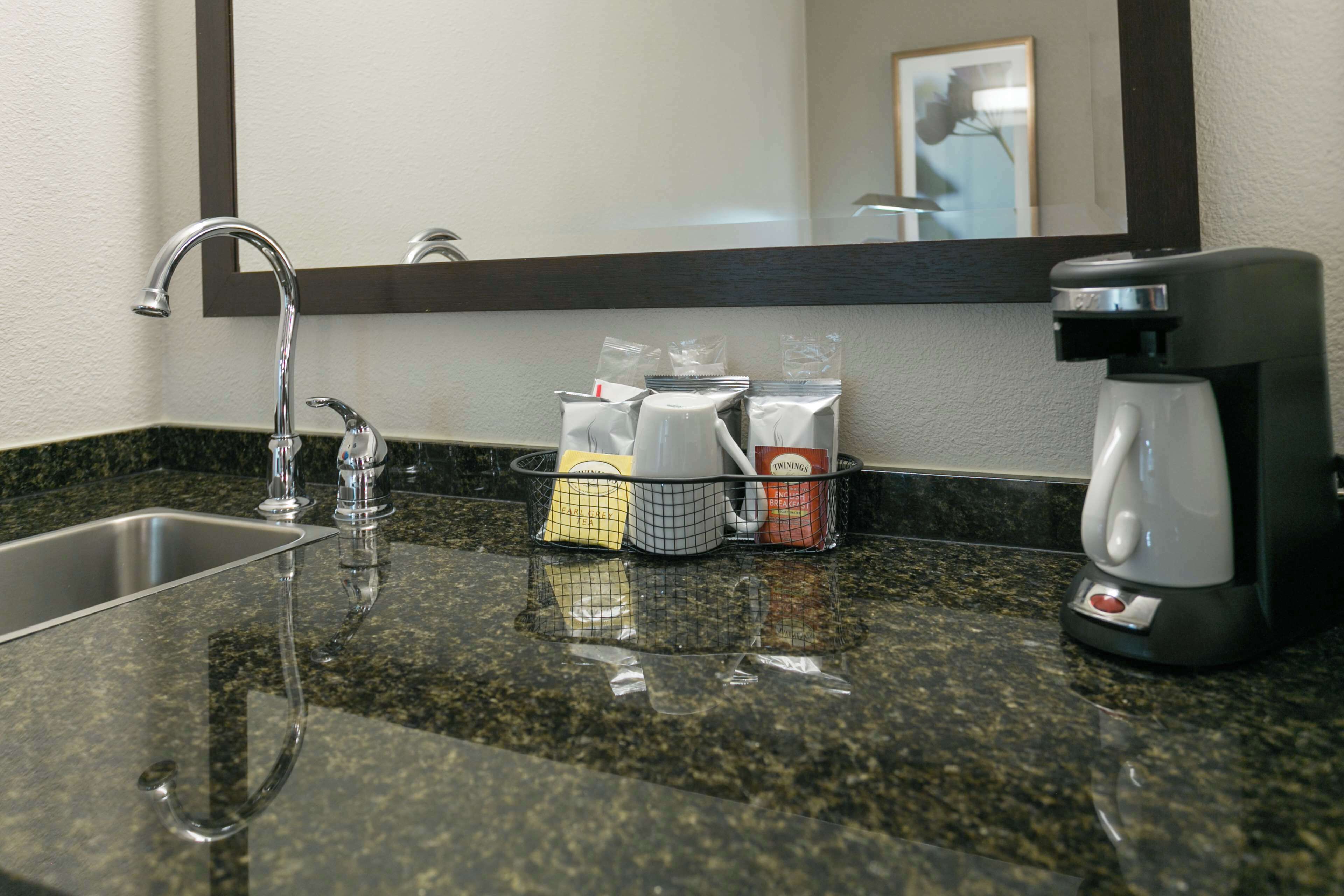 premium bedding, desk, blackout curtains, iron/ironing board