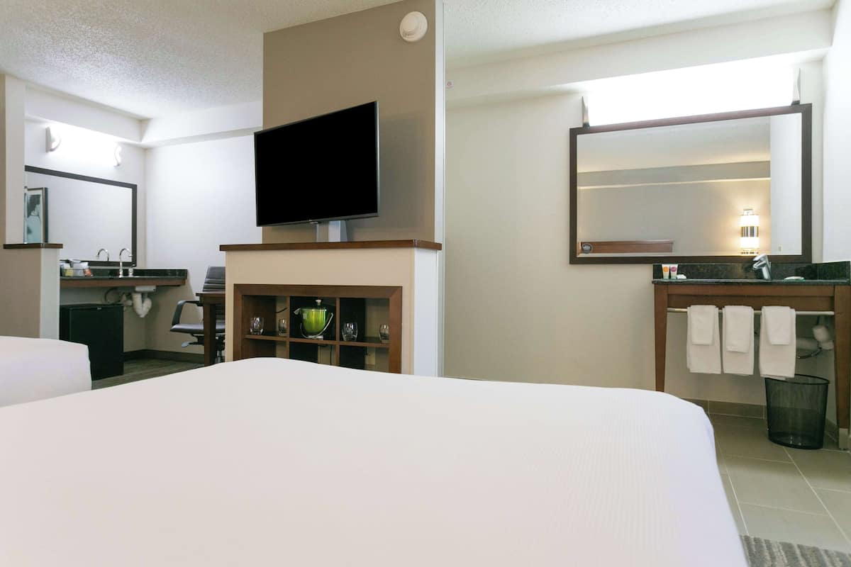 Premium bedding, desk, blackout curtains, iron/ironing board