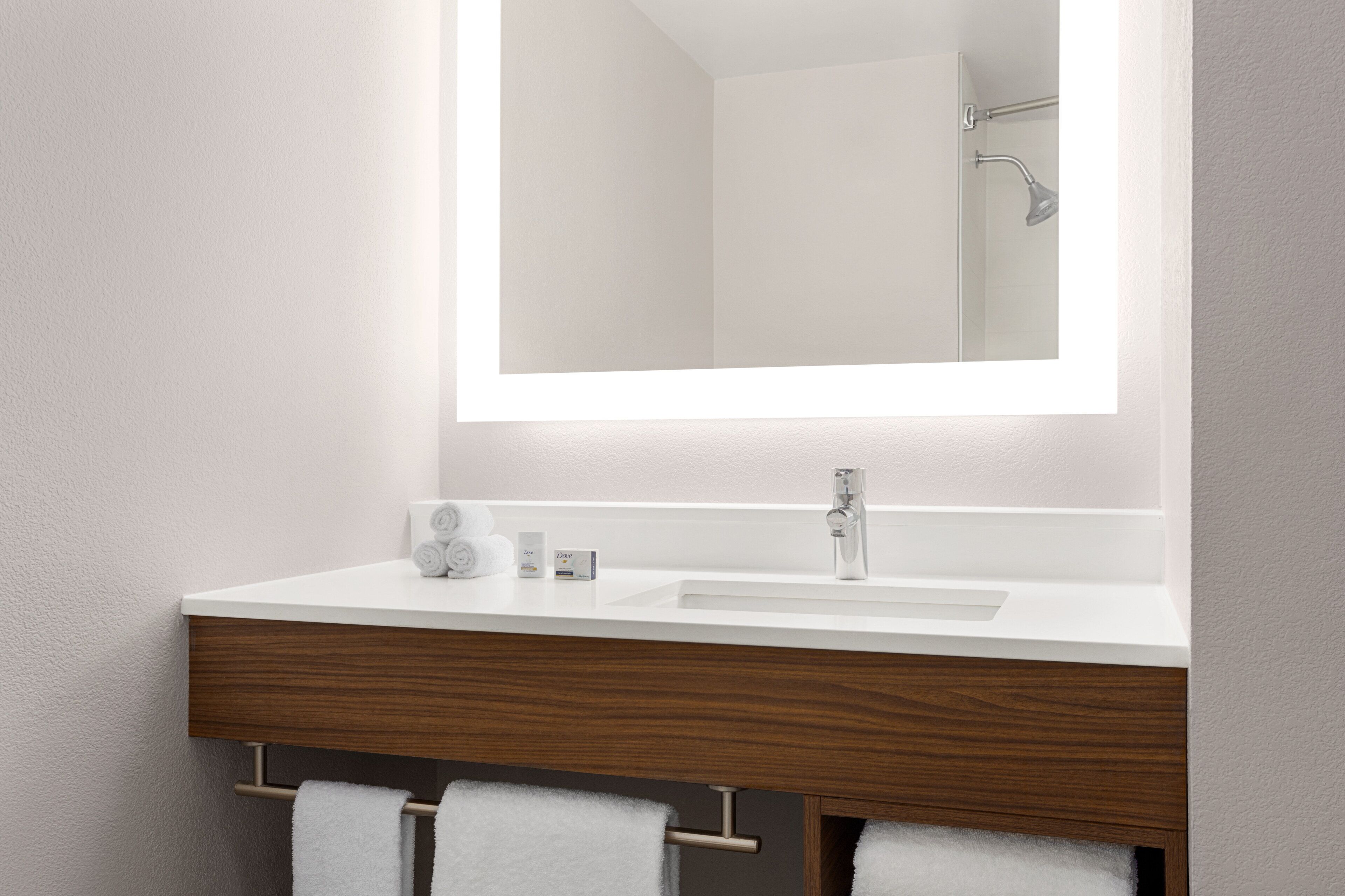 combined shower/bathtub, deep-soaking bathtub, hair dryer, towels