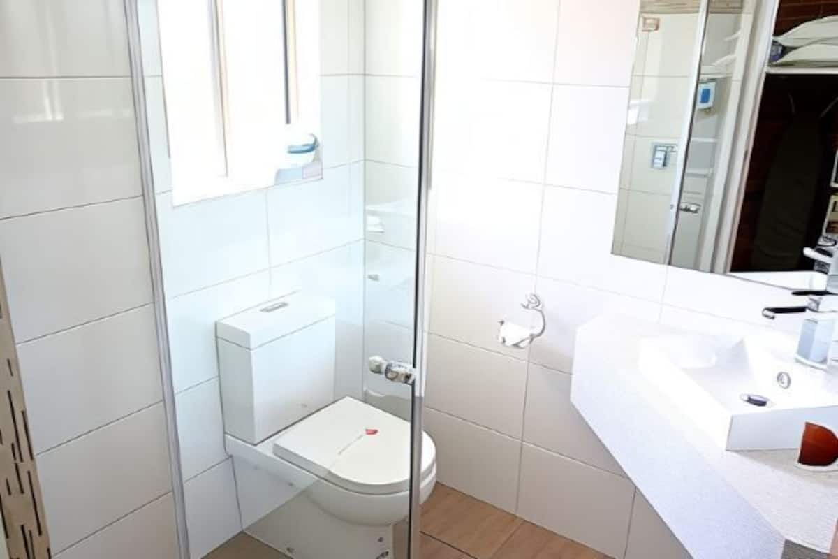 Bathroom | Shower, hair dryer, towels
