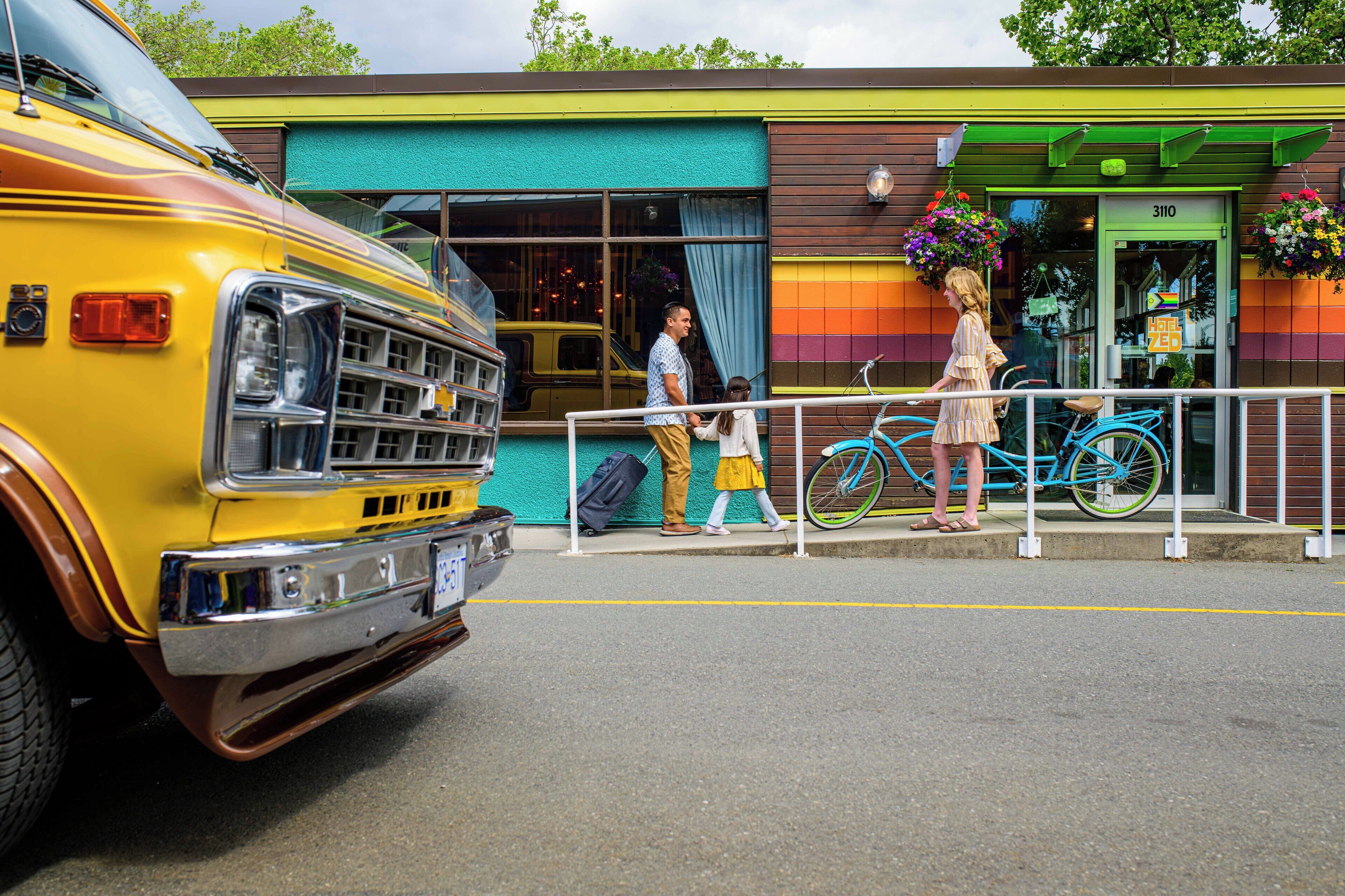 A colorful building with a green awning and a door number 3110.