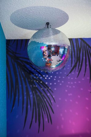 A disco ball hanging from the ceiling.