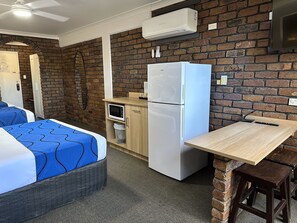 Family Room, Patio, Garden View (Family Suite) | Private kitchenette | Full-sized fridge, microwave, electric kettle, toaster