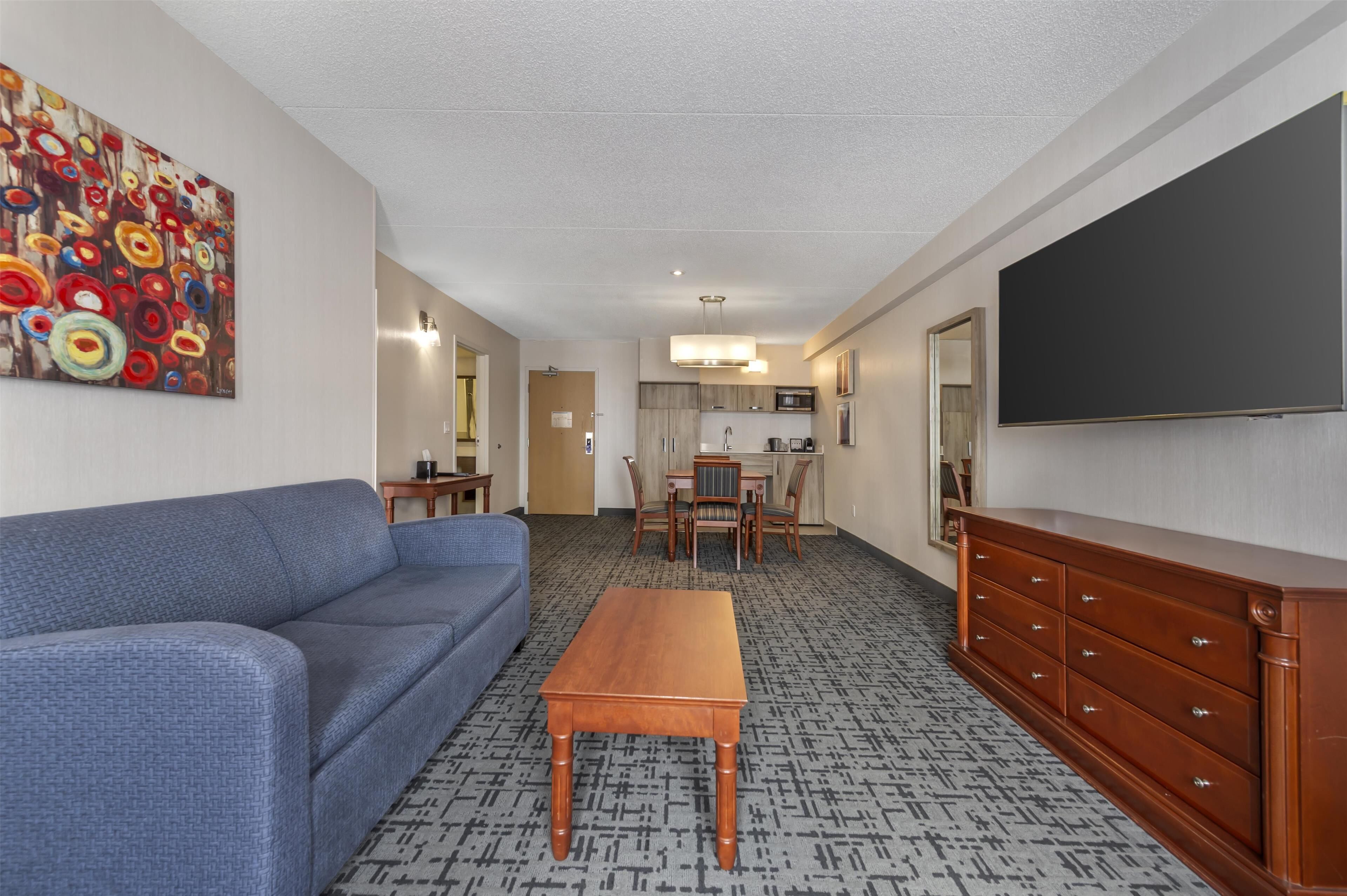 suite, 1 king bed, non smoking, jetted tub (with sofabed) | memory-foam beds, in-room safe, blackout curtains, soundproofing