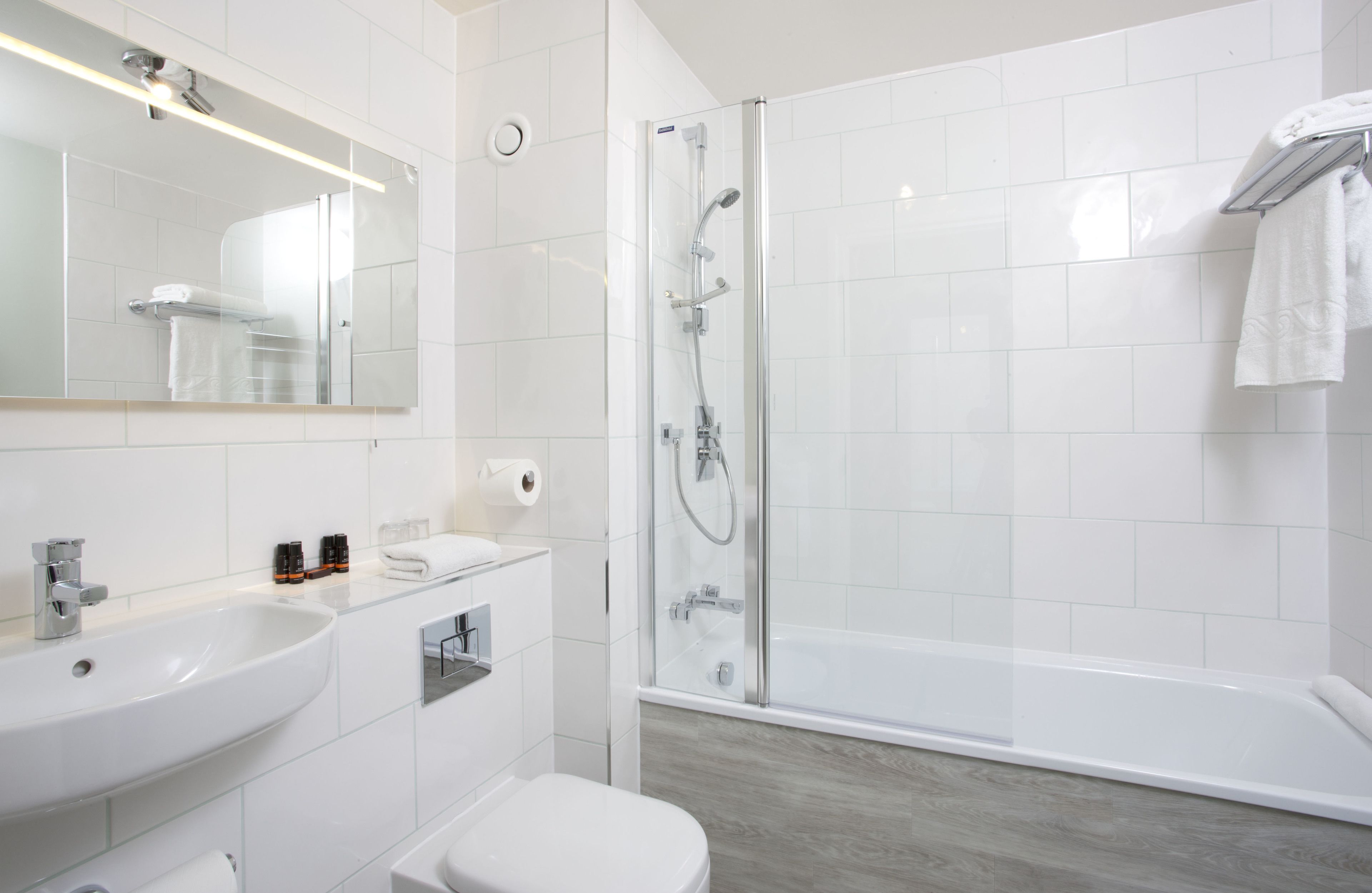 combined shower/bathtub, free toiletries, hair dryer, towels