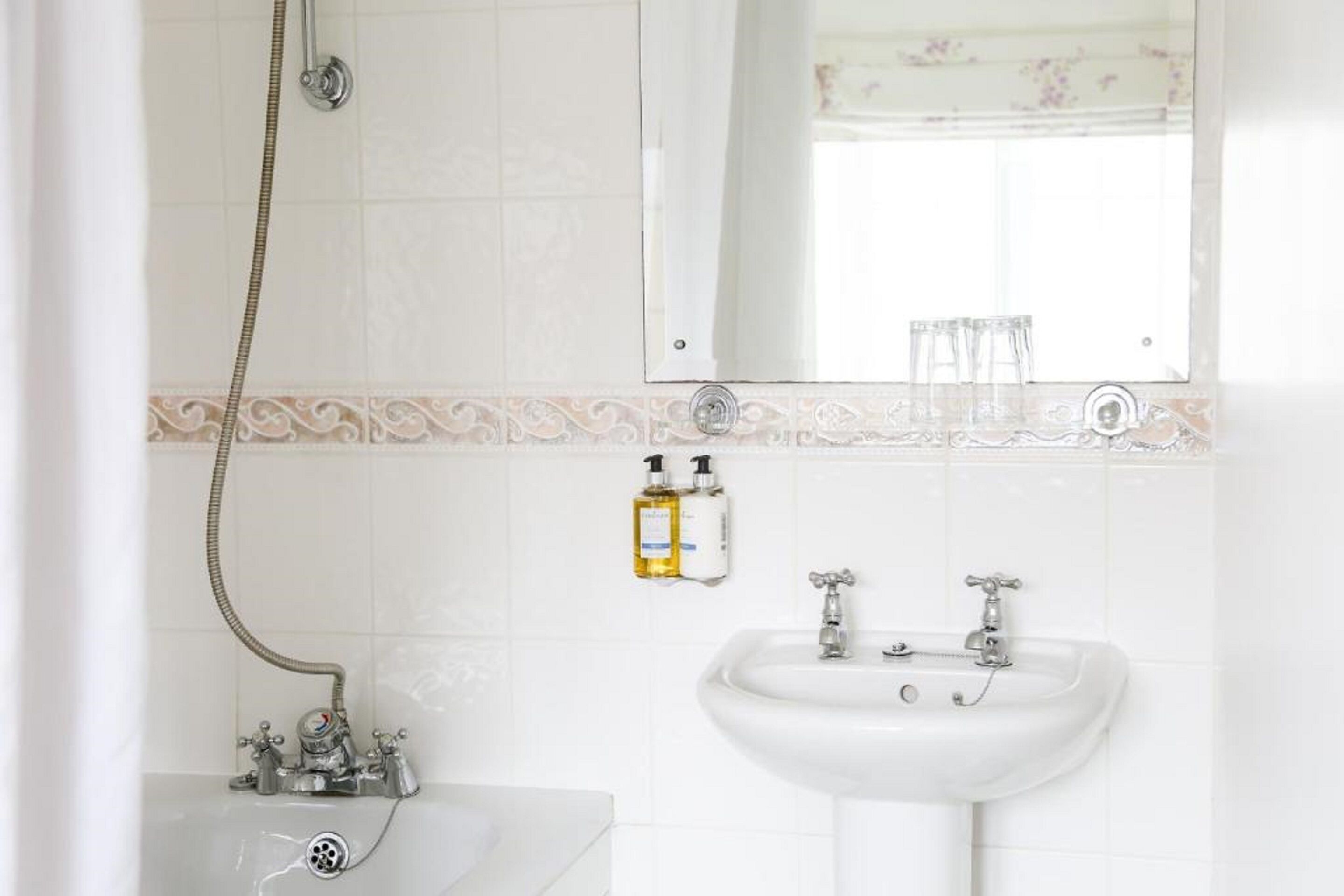 combined shower/bathtub, free toiletries, hair dryer, towels