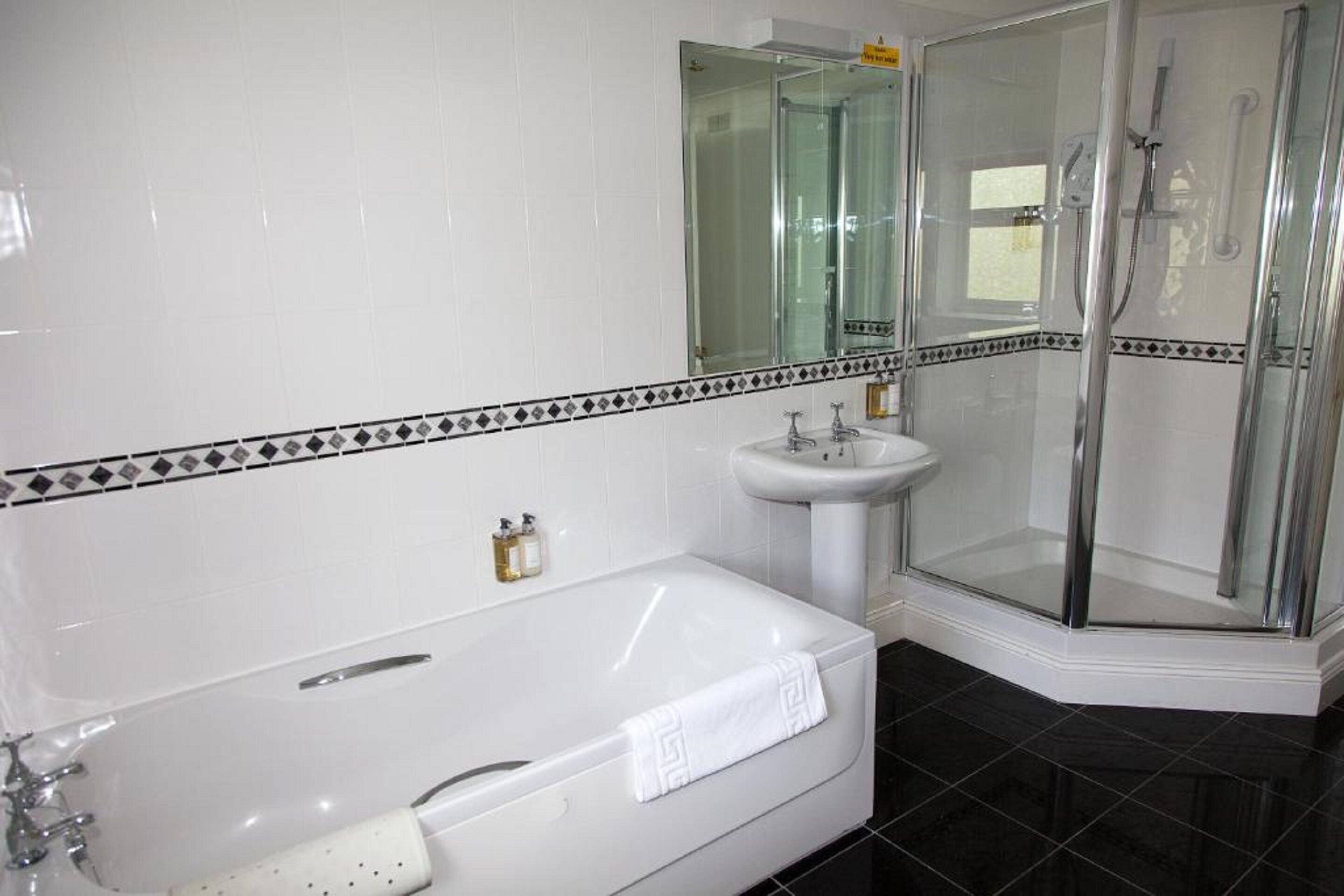 combined shower/bathtub, free toiletries, hair dryer, towels