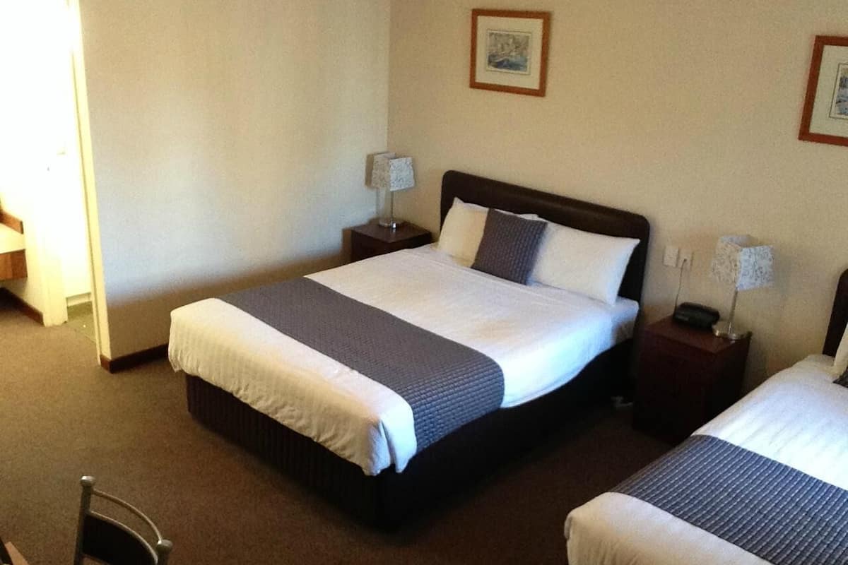 Standard Double or Twin Room | Minibar, iron/ironing board, bed sheets, alarm clocks