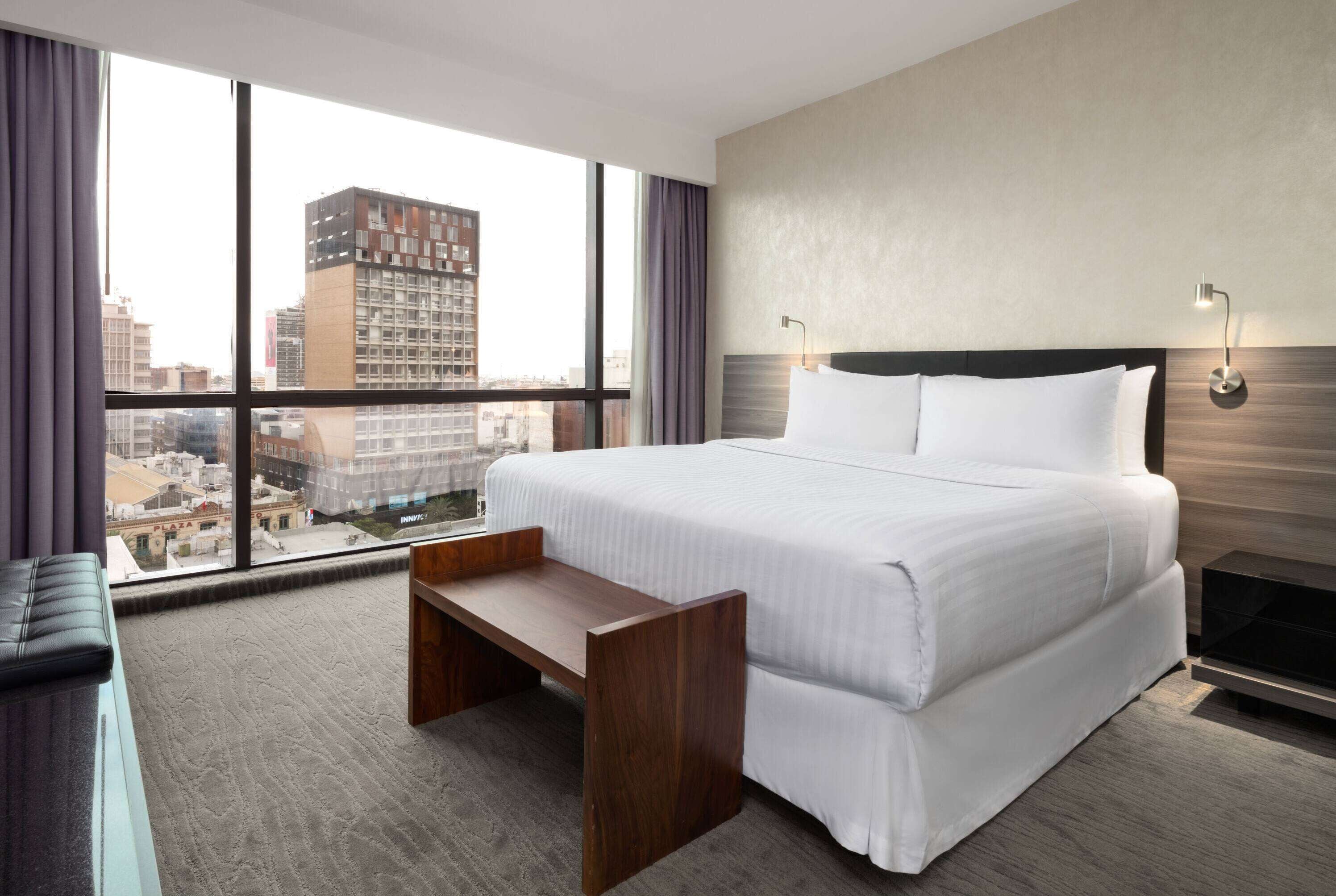 Ropa de cama de alta calidad y camas con pillow-top 