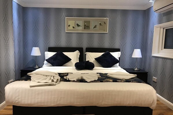 In-room safe, individually furnished, laptop workspace, blackout drapes