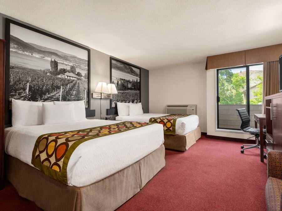 Desk, blackout drapes, iron/ironing board, free cribs/infant beds