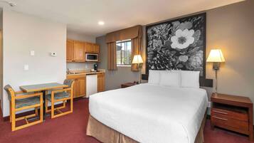 Desk, blackout drapes, iron/ironing board, free cribs/infant beds