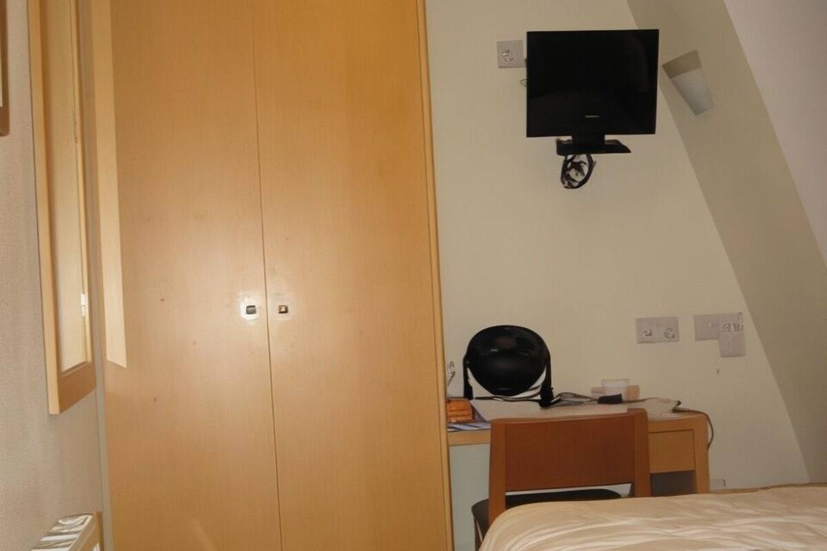 Blackout curtains, iron/ironing board (on request), free WiFi