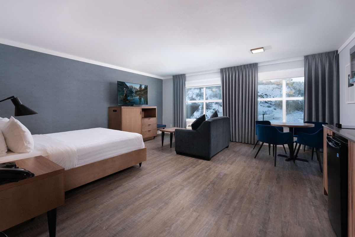 suite, 2 queen beds, non smoking, kitchenette (living room;with single sofabed) | 1 bedroom, premium bedding, pillow-top beds, in-room safe