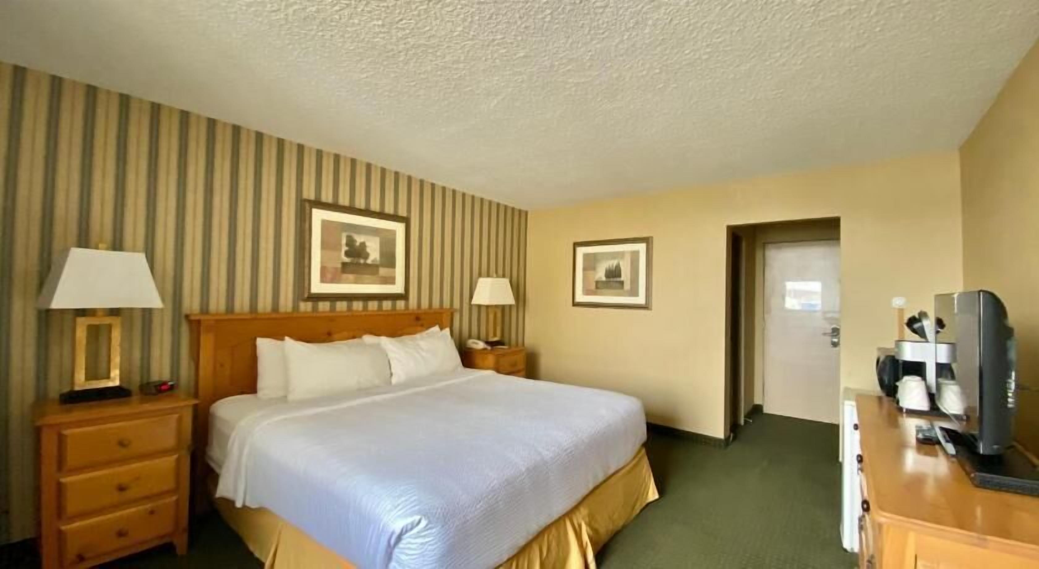 Pillowtop beds, desk, blackout drapes, iron/ironing board
