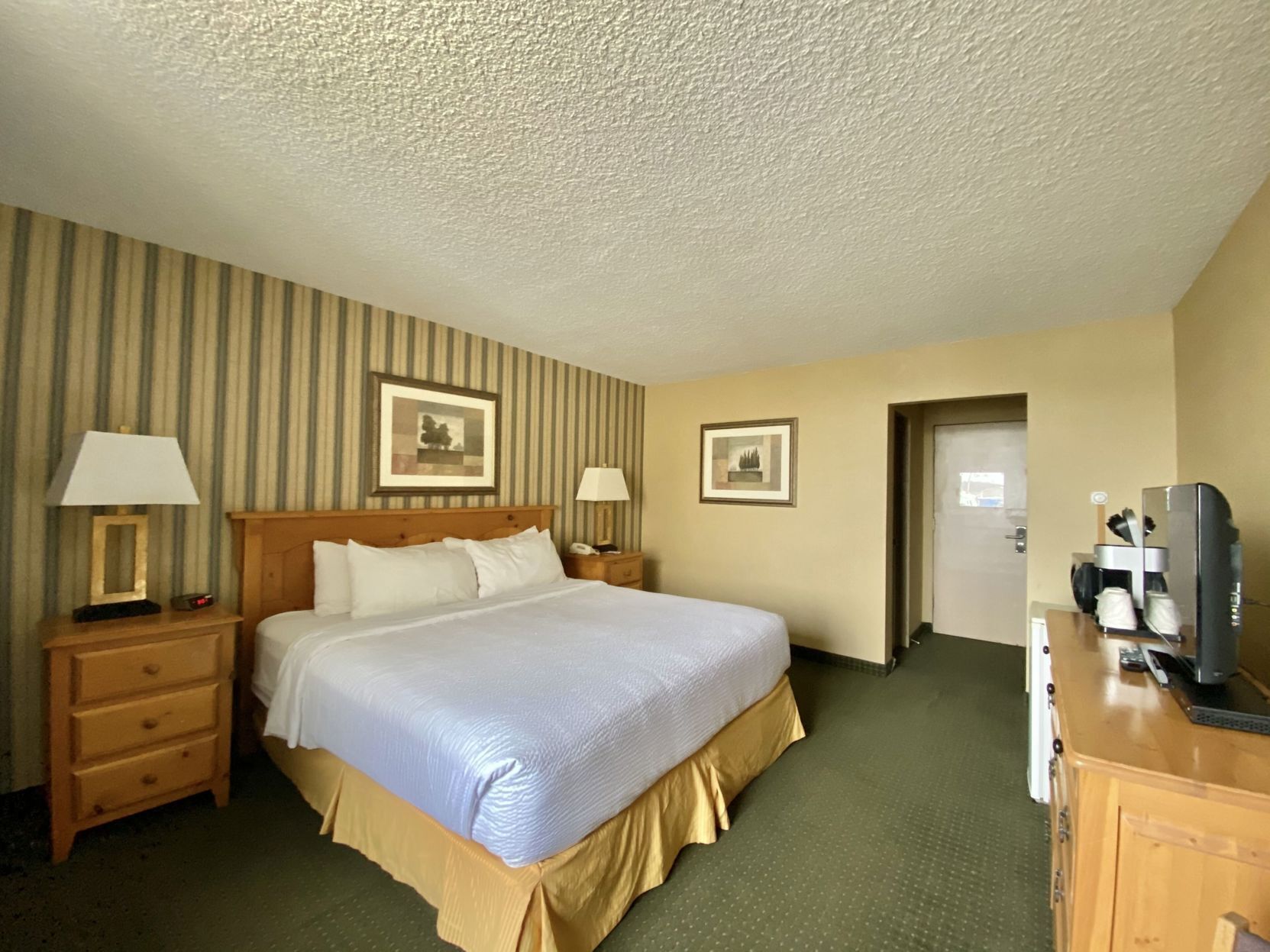 Pillowtop beds, desk, blackout drapes, iron/ironing board