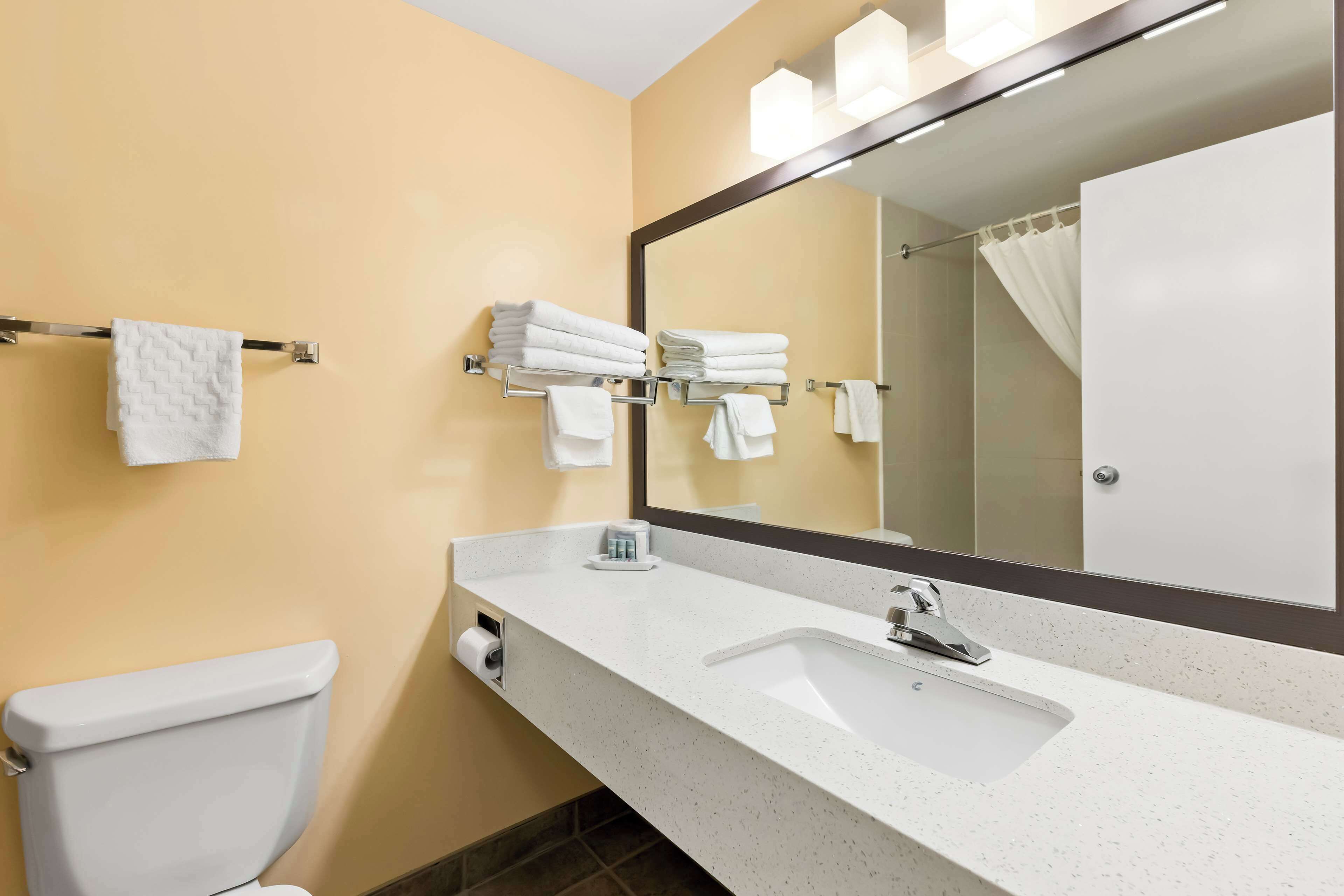 standard room, 2 queen beds, non smoking | bathroom | free toiletries, hair dryer, towels, soap