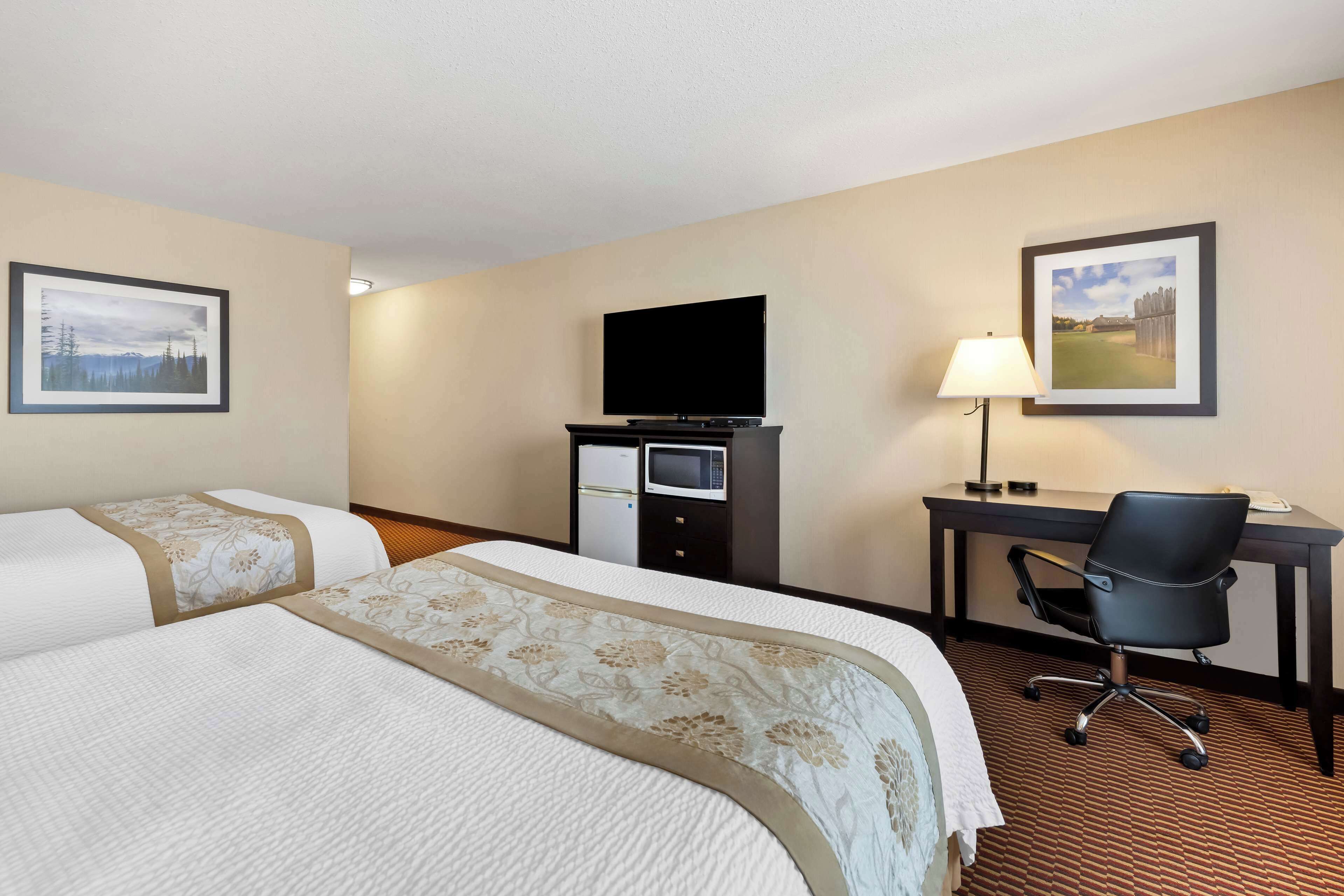 standard room, 2 queen beds, non smoking | desk, laptop workspace, iron/ironing board, free wifi